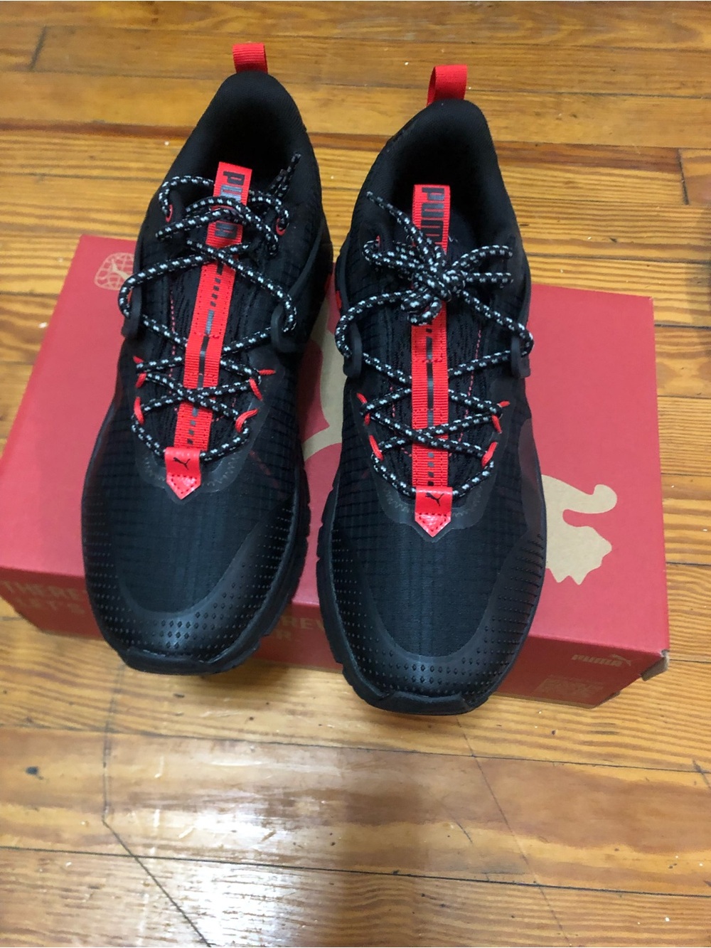 Puma Men’s Black Sneakers with Red Accents